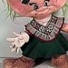 A very strange looking Troll doll of Rosie from the 1980s